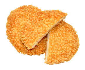 Two puffed rice covered chicken burgers isolated on a white background