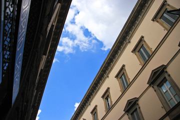Fototapeta na wymiar summer sky and apartment building