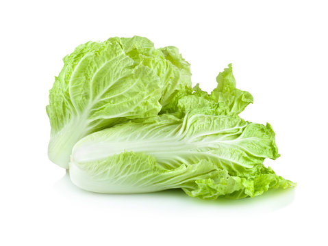 fresh chinese cabbage and a cut one on a white background