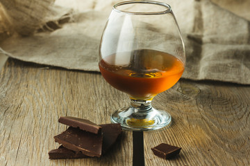 Cognac glass and chocolate