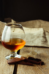 Cognac glass and chocolate