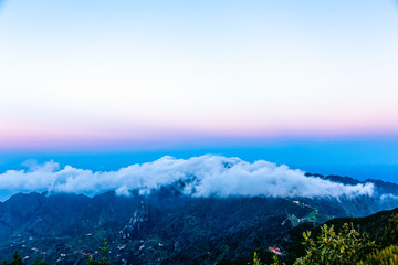 Obraz premium Landscape with clouds over mountain