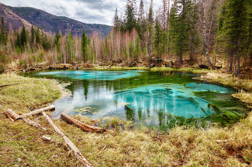 So-called blue geyser lake in Altay mountains - obrazy, fototapety, plakaty