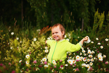 Child happy outdoors.