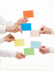Obraz premium Business people holding colorful cards
