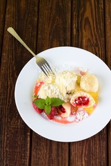 White plate with delicious strawberry dumplings © yommy