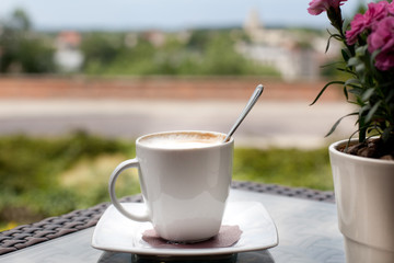 Cup of coffee on the balcony. Relax concept