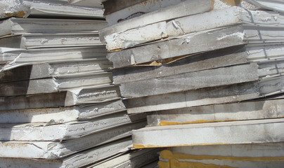 stacked industrial isolation foam on a demolition site