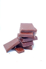 broken chocolate pieces on white background