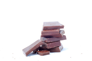 broken chocolate pieces on white background