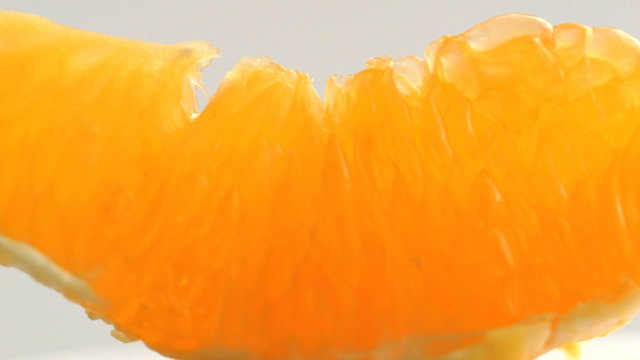 orange lith rotating closeup, beautiful soft focus macro shot (HD, high definition 1080p, loop, seamless loop) orange pulp