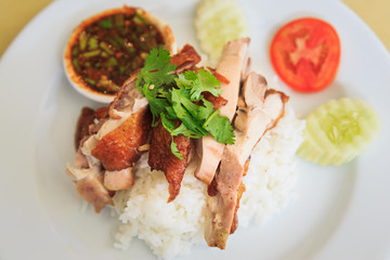 Grilled chicken with Rice and spicy sauce.Thai food