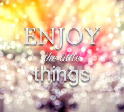 Enjoy the little things words on defocus background