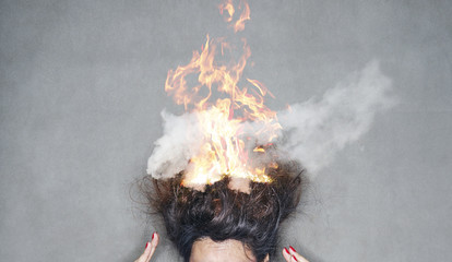 brunette woman head hair on fire in flames - 85467368