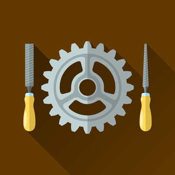 File hand tools with wooden handle around gear wheel