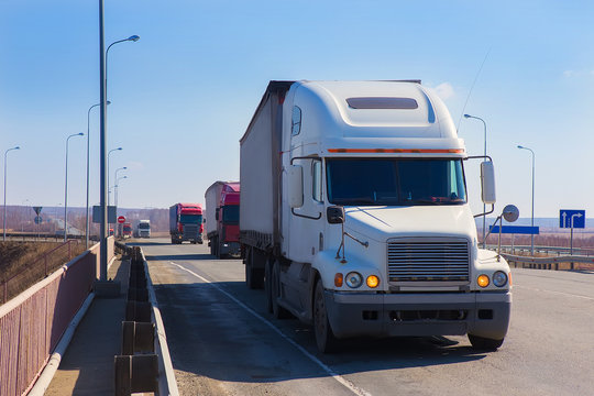 convoy trucks move on highway