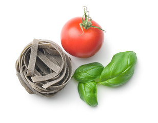 tagliatelle pasta with tomato and basil leaf