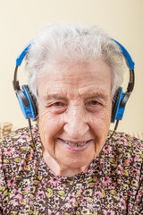 senior woman wearing headphones