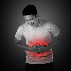 Asian man have stomach ache