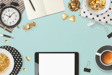 Website header design with digital tablet and feminine glamour objects over blue background