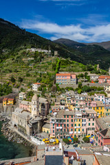 Fototapeta na wymiar The Cinque Terre is a string of centuries-old seaside villages on the rugged Italian Riviera coastline. In each of the 5 towns.