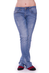 Frauenbeine in Jeans