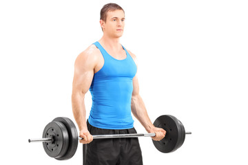 Fototapeta na wymiar Male athlete exercising with a barbell isolated on white