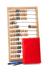 old wooden abacus notebook and pen