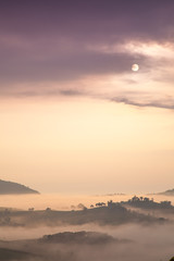 Sunrise and mist