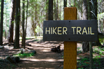Hiker trail sign in the forest