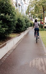 Fototapeta na wymiar teenage girl riding a bicycle
