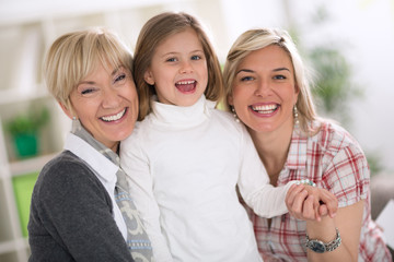 Happy women with little girl