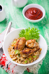 Baked chicken wings with rice