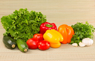 The image with vegetable on straws background