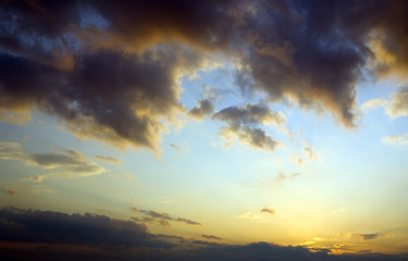 Fototapeta na wymiar colorful dramatic sky ans clouds at sunset