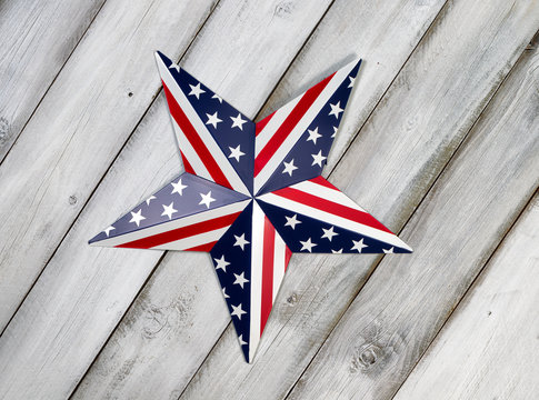 Fourth of July Star on rustic white wooden boards