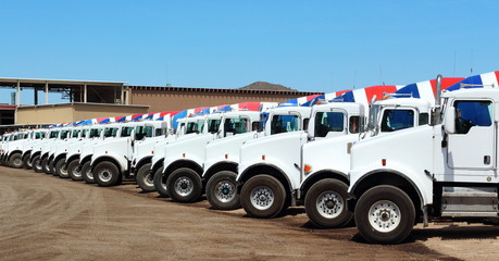 Cement Construction Trucks - Row of parked Construction Trucks