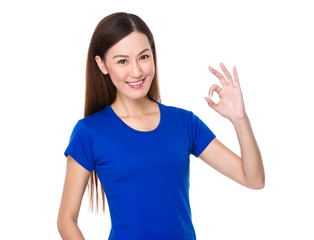 Pretty woman with ok sign gesture