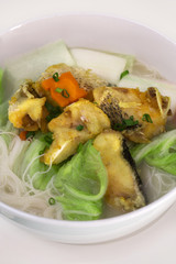 Fried fish rice noodle soup
