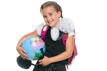 Portrait of a cute little girl with globe