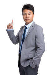 Young businessman with finger point up