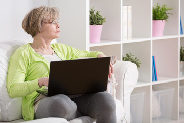 Busy elderly woman