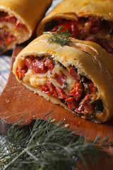 tasty pie with ham, cheese and pepper macro vertical
