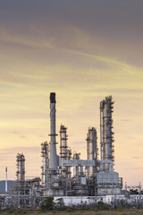 Oil refinery at twilight sky.