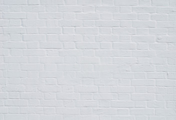 Fototapeta na wymiar Brick wall with white whitewashing close up