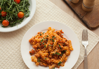 pasta bolognese tomato beef sauce on the kitchen table