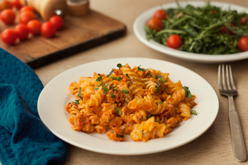 pasta bolognese tomato beef sauce on the kitchen table