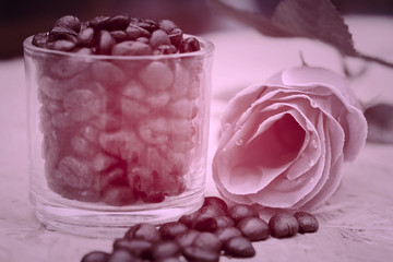 coffee beans and pink roses