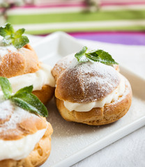 Profiteroles, cream puff, traditional French dessert