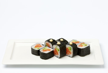 Sushi on white plate